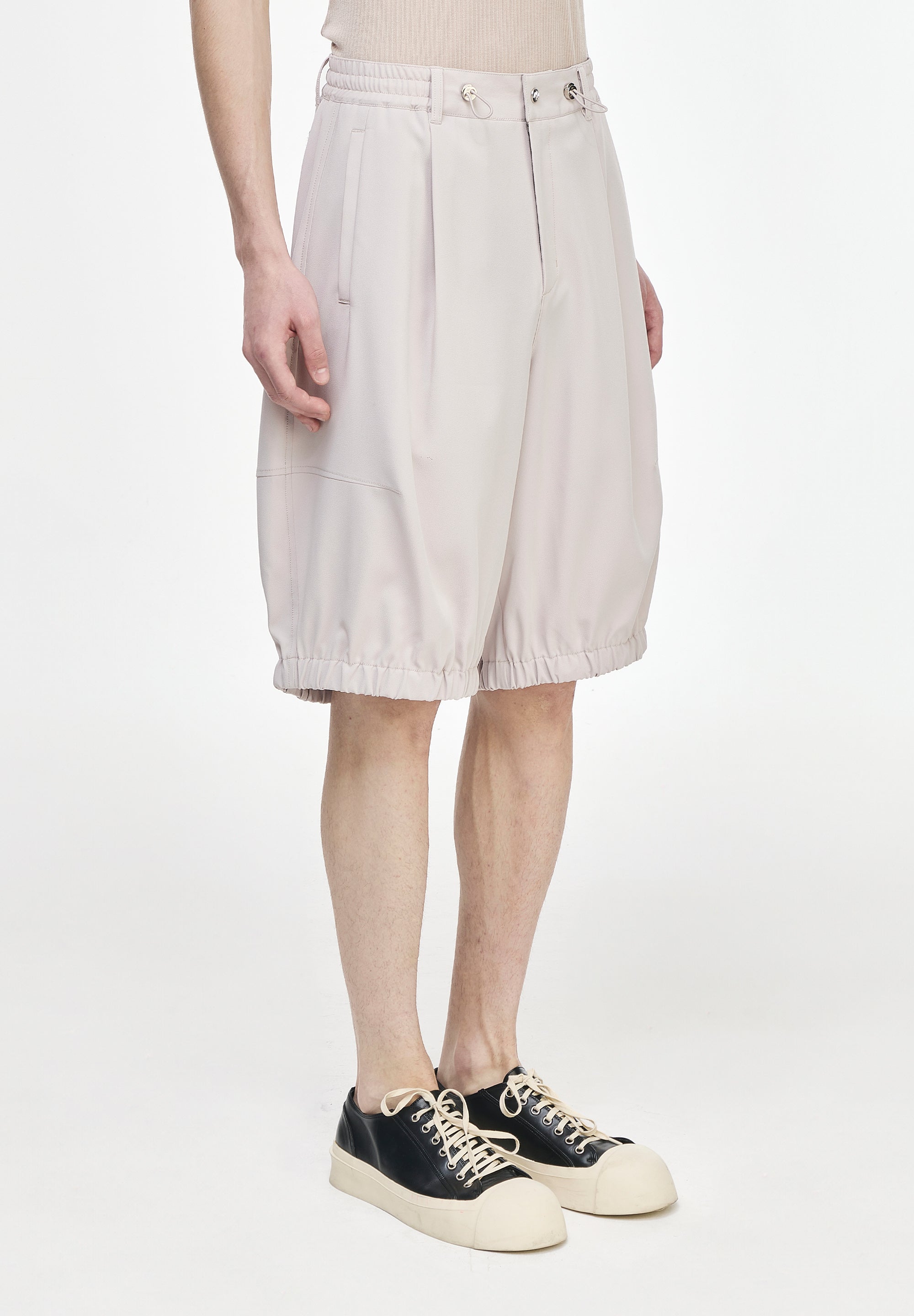 CURVED DART BERMUDA PANTS