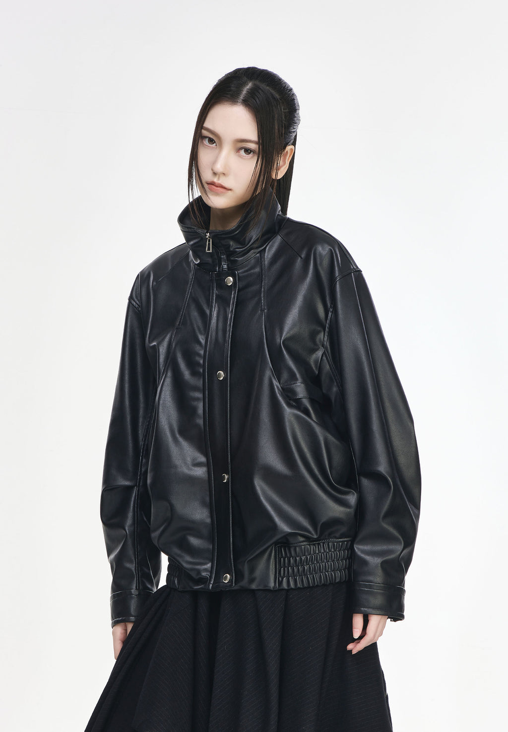 CURVED VOLUME LEATHER JUMPER