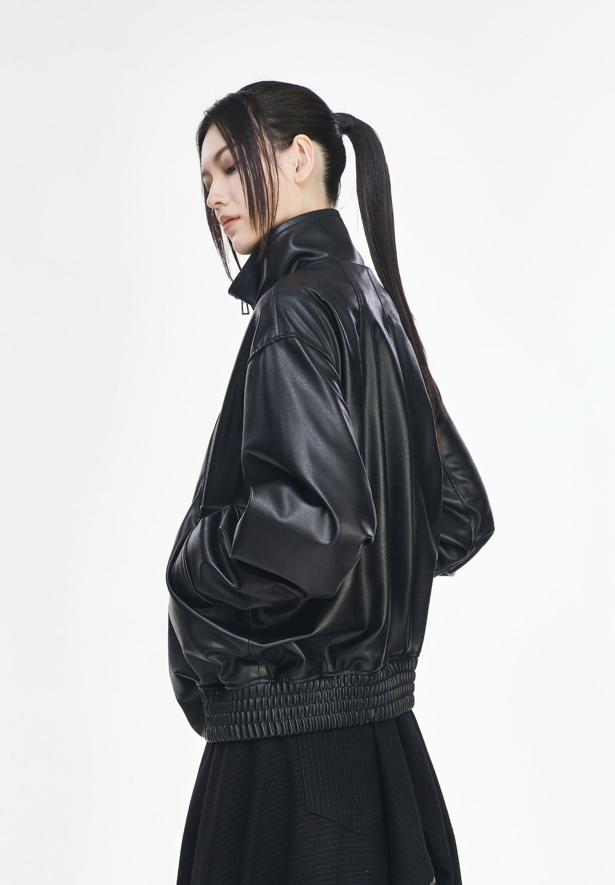 CURVED VOLUME LEATHER JUMPER