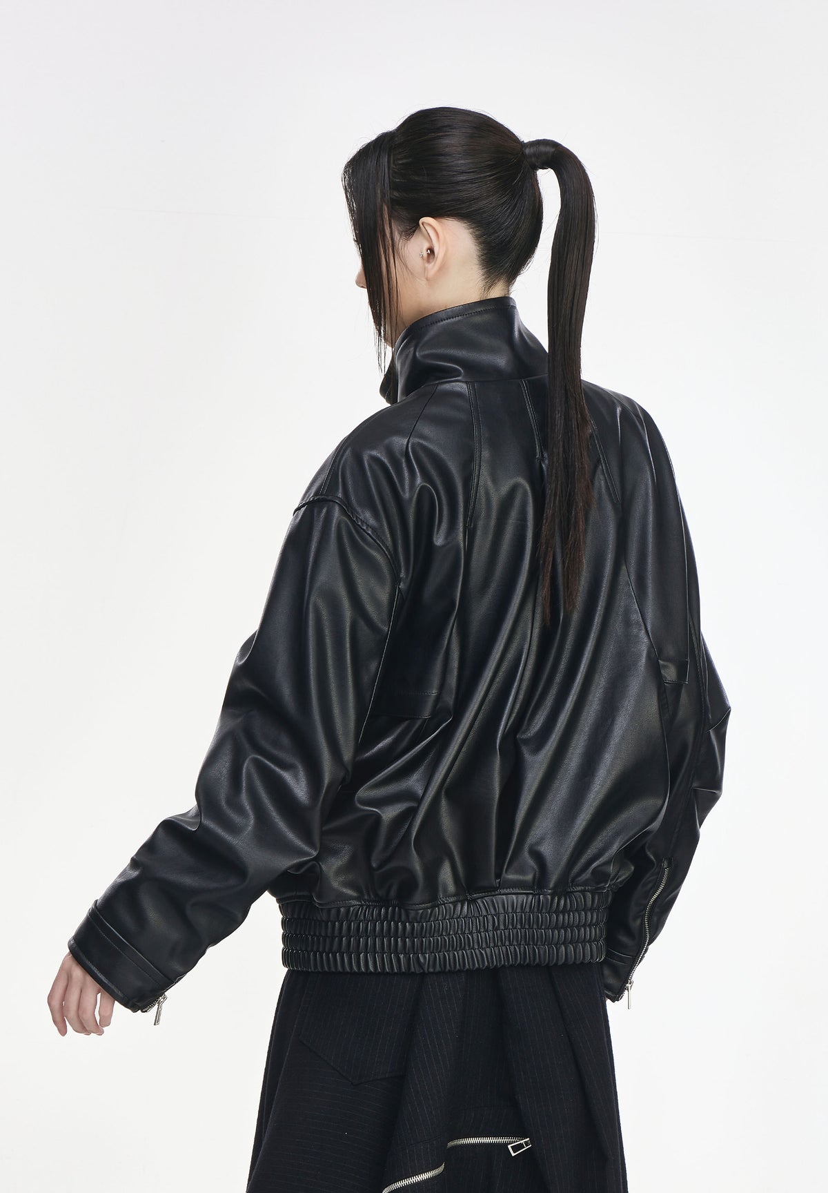 CURVED VOLUME LEATHER JUMPER