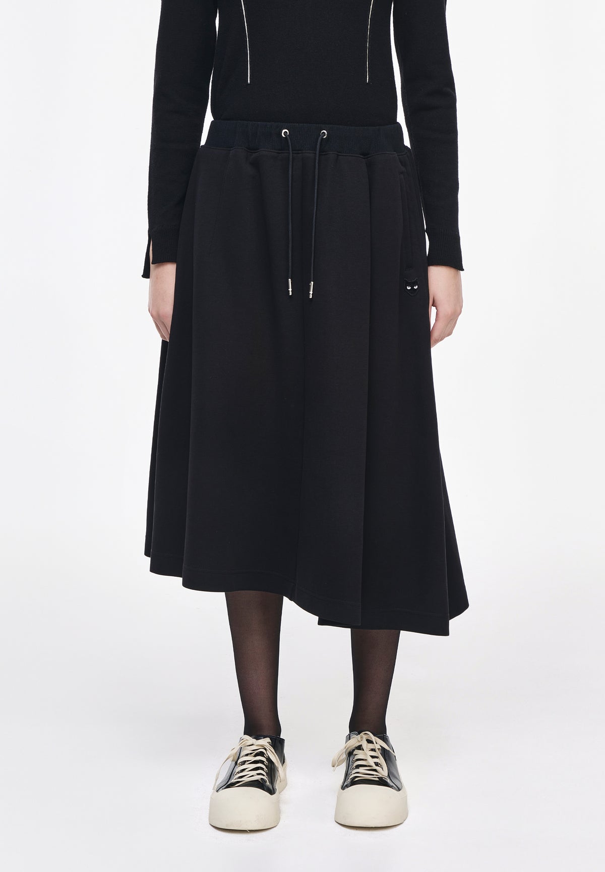 PANTHER ASYMMETRIC SKIRT