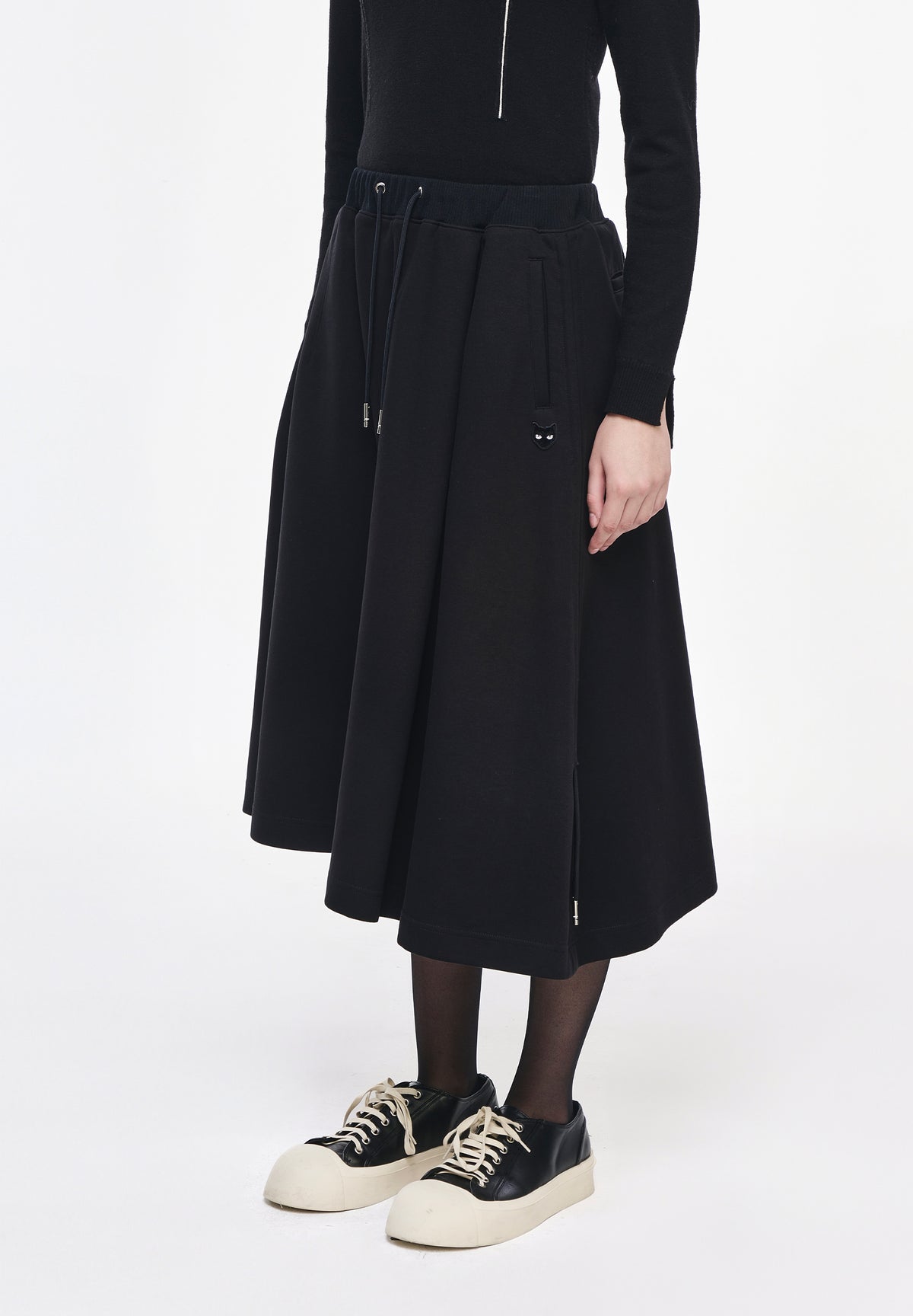 PANTHER ASYMMETRIC SKIRT