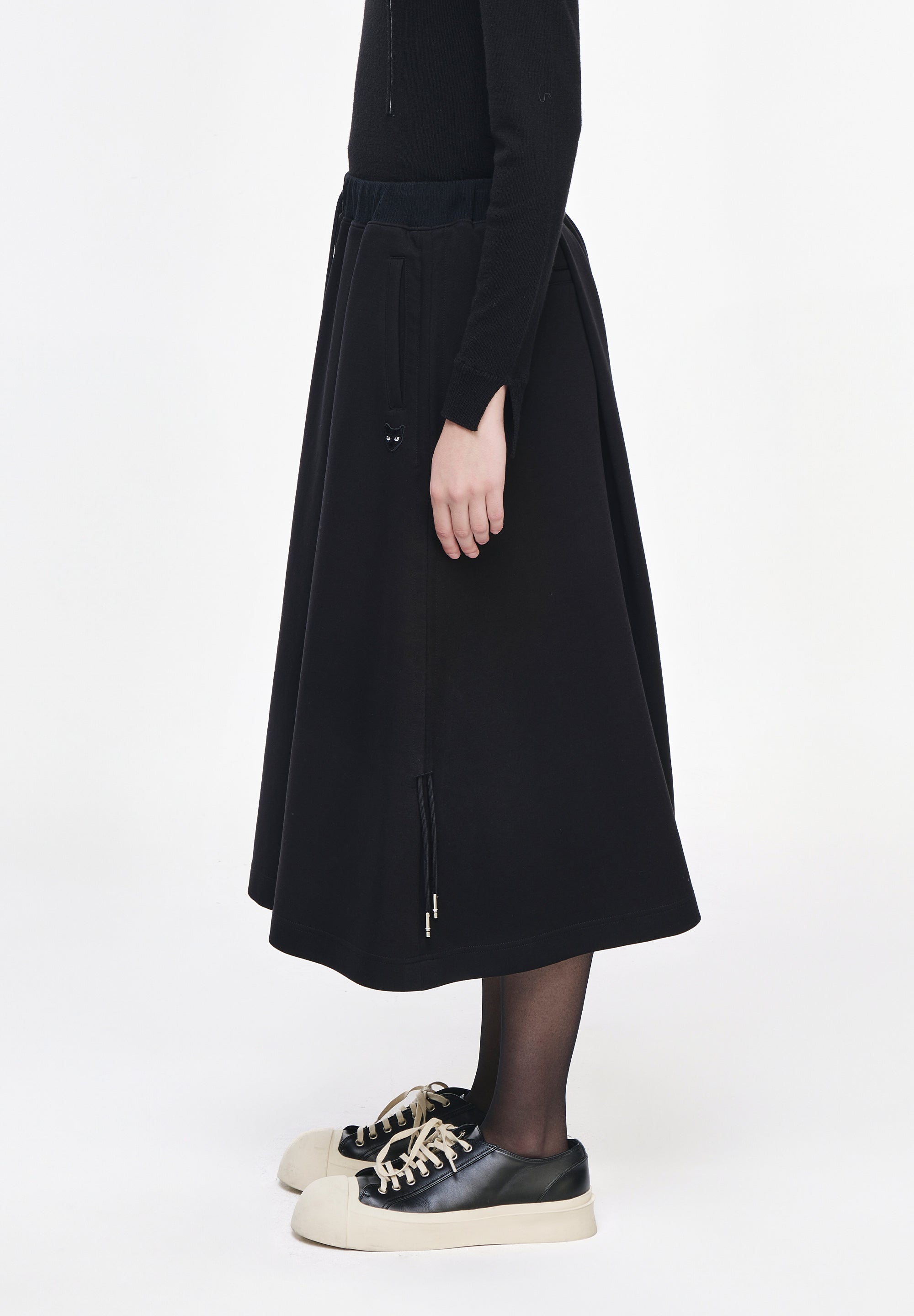 PANTHER ASYMMETRIC SKIRT