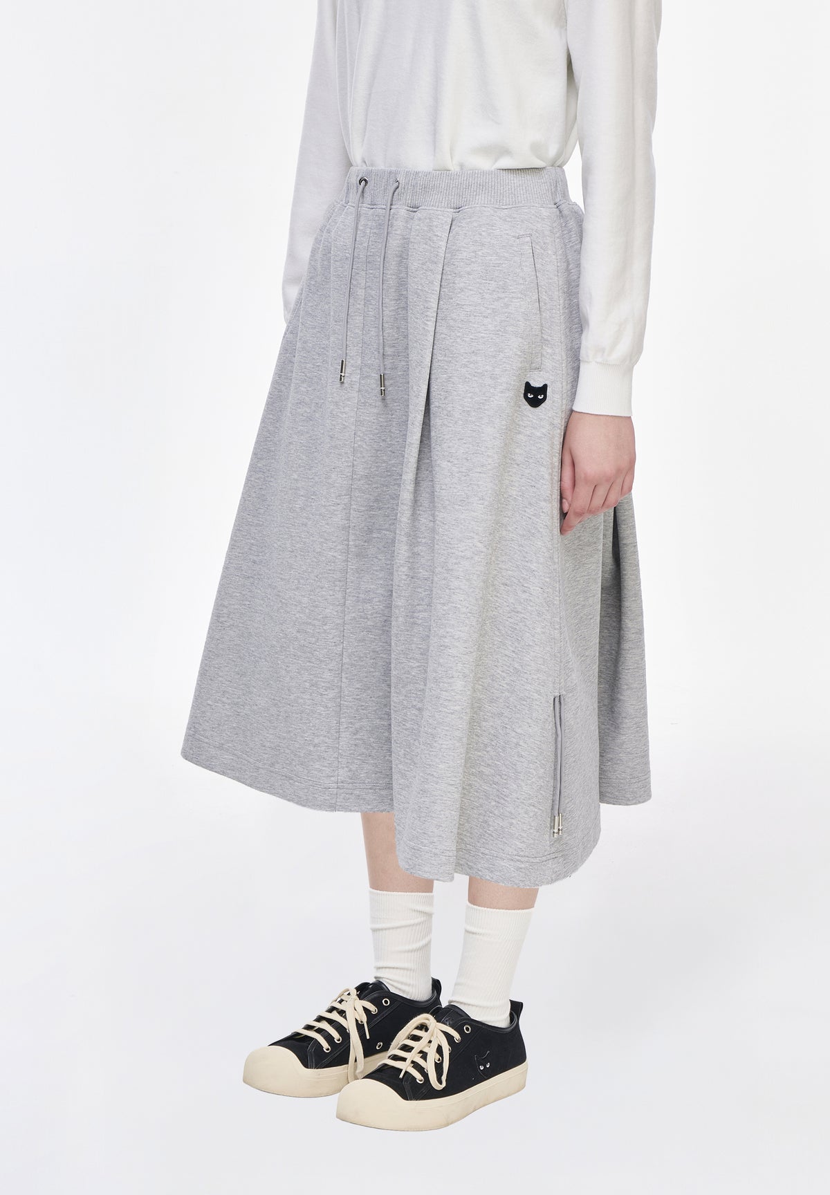 PANTHER ASYMMETRIC SKIRT